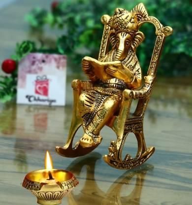 Ganesha on Rocking Chair Statue | Golden Idol Reading Ramayan